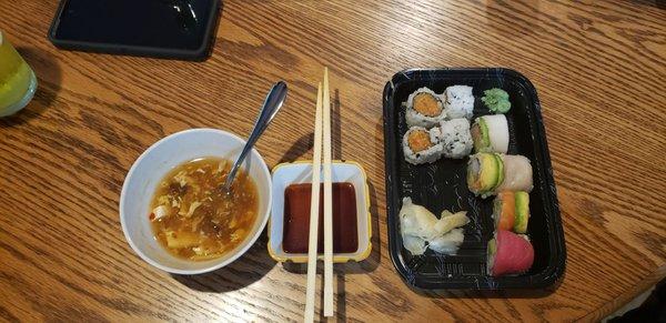 Hot and sour soup, spicey salmon roll, rainbow roll