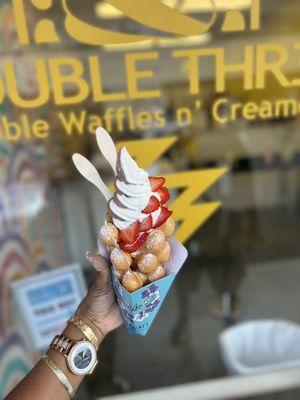 Soft serve swirl ice cream original bubble waffle cone with strawberries