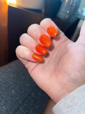 orange sparkly acrylic nails