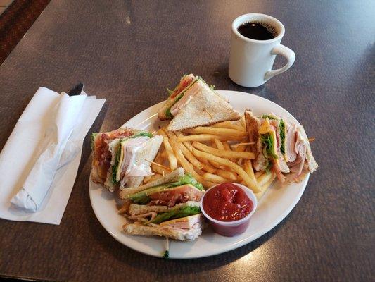 Turkey club with French fries