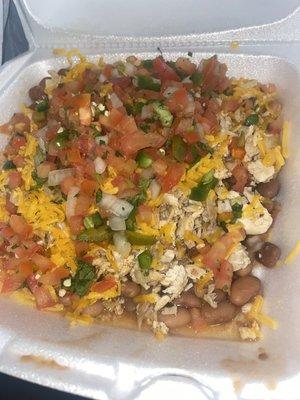 Taco salad while beans  hold the lettuce