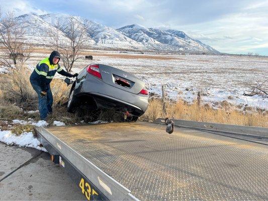 Picture of the car that slid off the road.