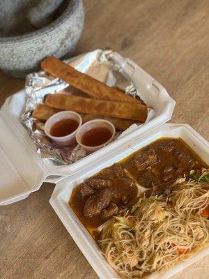 Pork adobo, pancit, and chicken lumpia.