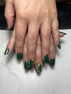 Dipped nails with a design.