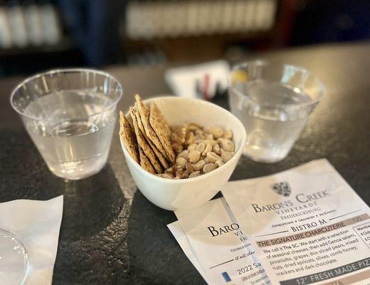 Tasty crackers and nuts to munch on while getting our sip on! (Not in menu)