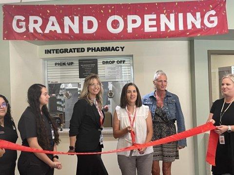 Plano Pharmacy ribbon cutting.