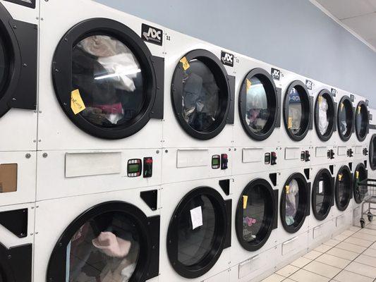 Most of their dryers being used for their fluff n fold service on a Tuesday evening