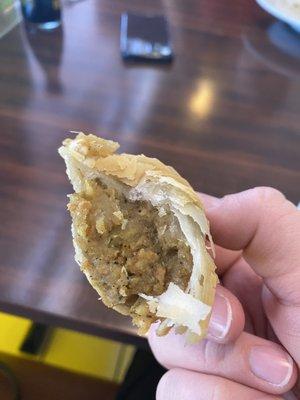 Curry puff on the inside: SO DELICIOUS!!!! More sweet and seasoned than spicy. Don't think they have meat, but can't be sure...