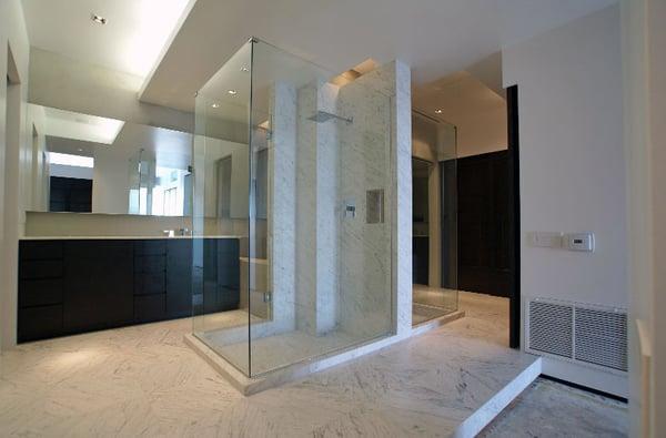 Custom Frameless 90 degree Shower Enclosure with Wall Mount Hinges.