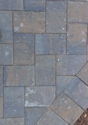 Pavers purchased from Brickyard. The white spots cannot be removed with soap, water and scrubbing.