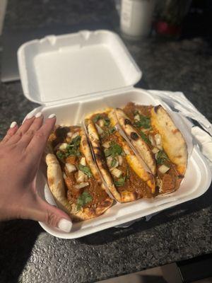 Butter chicken naan tacos