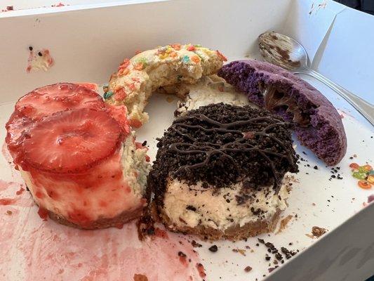 Strawberry and Oreo cheesecakes, fruity pebbles cookie, choco chip cookie, and purple midnite cookie