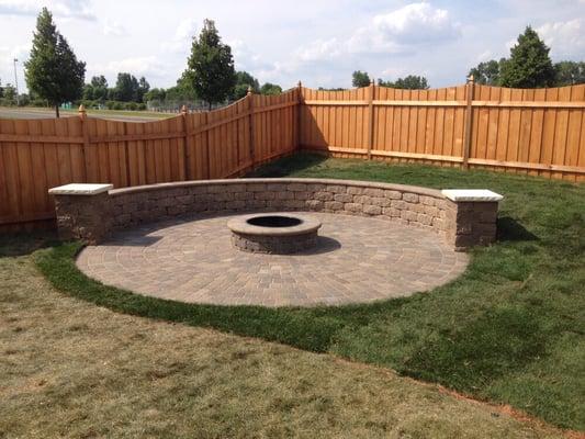 18 ft paver fire pit with a free standing wall