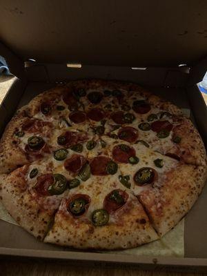 Jalapeño and pepperoni pizza