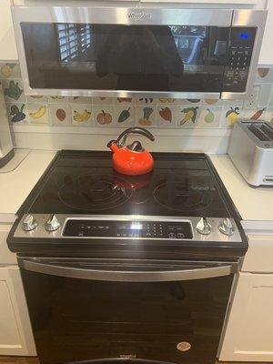 Whirlpool Brand! LOVE the above Micro- fits perfectly - installed by Pedro! Slide in Stove Top/Oven is beautiful with the black trim kit!