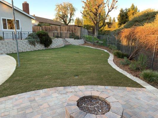 New sod, stairs and fire pit