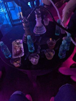 Hookah drinks ropped off section for table/seating for about 6