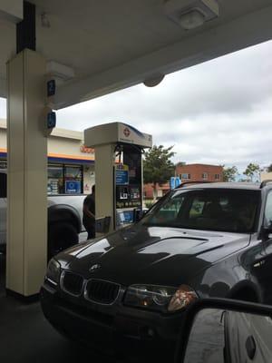 Too many people sitting at the pumps just talking on their cell phones!