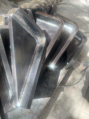 Production welding of structural brackets.