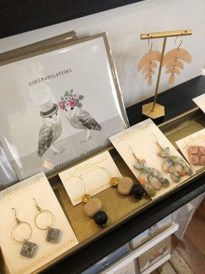 We love our artists!  Original art, jewelry and accessories offered.