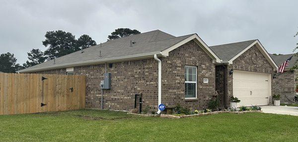 Beautiful home protected from hard water by our RainMizer Seamless Gutters