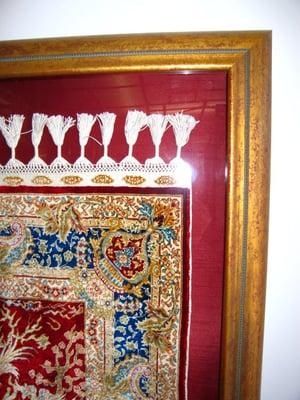 Artisan rug displayed in shadow box