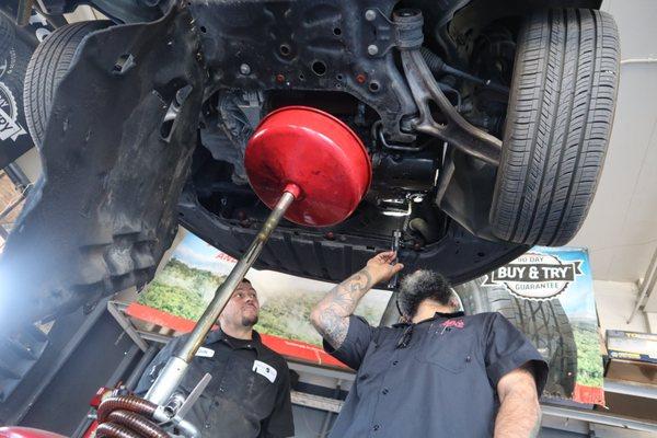 Olin & Carlos Inspecting a vehicle!