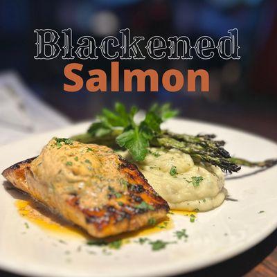 Blackened verlasso salmon served with roasted tomato butter, garlic mash, asparagus