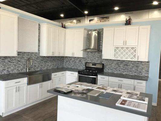 White Shaker Kitchen Cabinets - no questions it is the most popular color right now.  Modern style is what people want now.