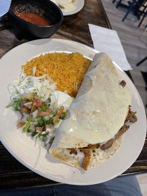 Texas cheesesteak with steak, chicken and shrimp.  Very good!