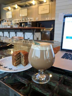 Lady Macbeth drink (seasonal coffee and spiced tea concoction made by the barista) and banana bread.