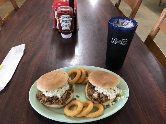 My 2 pulled pork sandwiches with slaw and onion rings and of course sweet tea