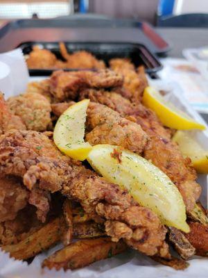 The triple threat - Fried chicken, shrimp, fish, and fries, but the fish was missing :/ so was my Mac & cheese & candied yams