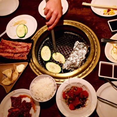 Rosu beef, toro beef, cheese wonton, spicy cold tofu, ahi poke, garlic fries, butter with mushrooms and zucchini