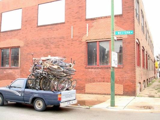 Look for the bikes, inside the building.