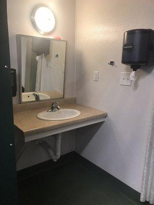 Sink area in bathroom.