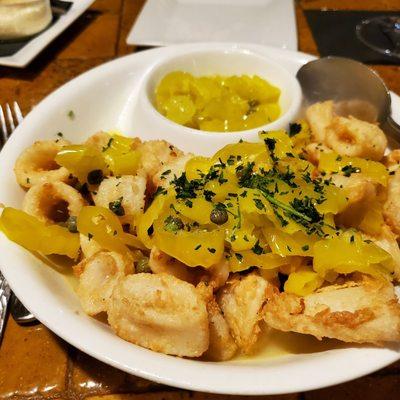 Calamari in butter sauce with pepper rings