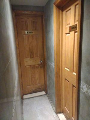 very narrow restroom doors