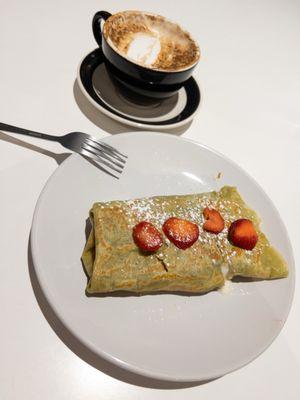 Sisu (specialty coffee) and the Seasonal Grinch Crepe (matcha crepe with strawberries and lemon cream)