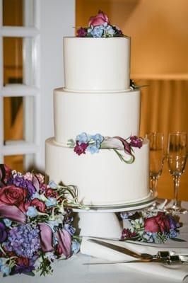 Flowers styled on wedding cake