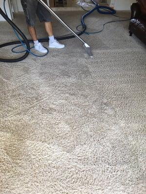 Living room during cleaning after pretreatment 8402 Castilian Dr., Huntington Beach