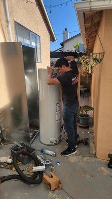 Tyler installed a new water heater and shed