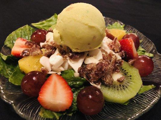 "Island Hotel Original Heart Of Palm Salad"... this salad is a must!! The pistachio ice cream is remarkable with the salad!!