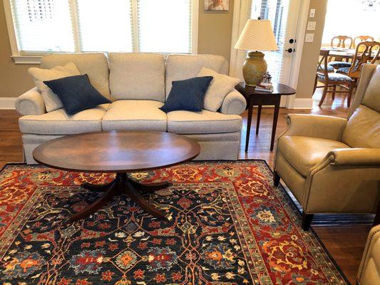 Antique reproduction Aryana rug in family room.