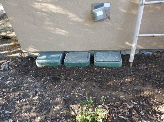 Installed boxes with garden water valves inside.