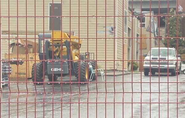 I took pictures of 2 (forklifts? I don't know what they're called) at our condos. Yellow just like the paint on my car.