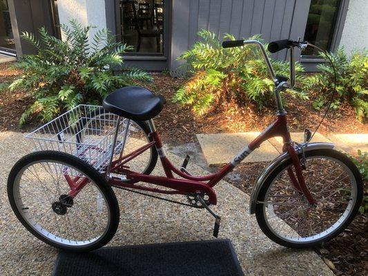 Red SUN trike with front light and basket