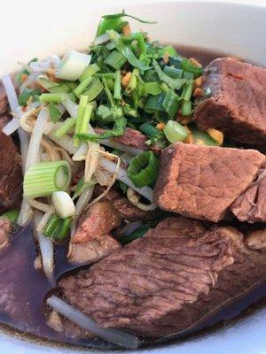 Beef Stew Noodles # 1 - Beef stewed in dark broth topped with fried garlic, scallion, cilantro