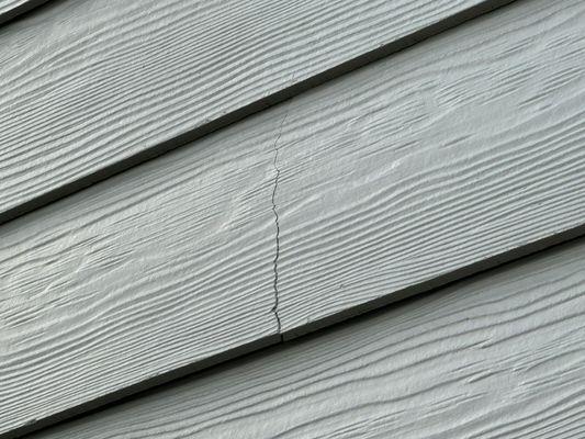 Cracked Allura fiber-cement siding