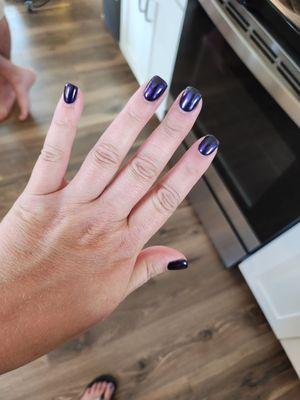 Chrome purple nails.   this almost a week later and I do some.very hands on work but my nails are still holding up!